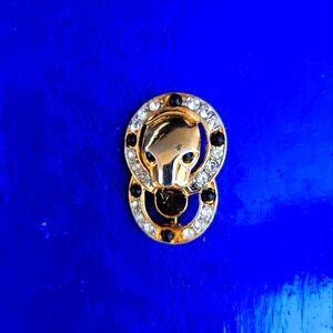 Vintage panther head pin with gemstones
